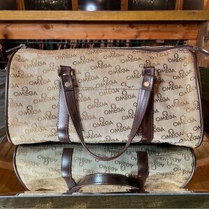 Omega canvas and leather bag